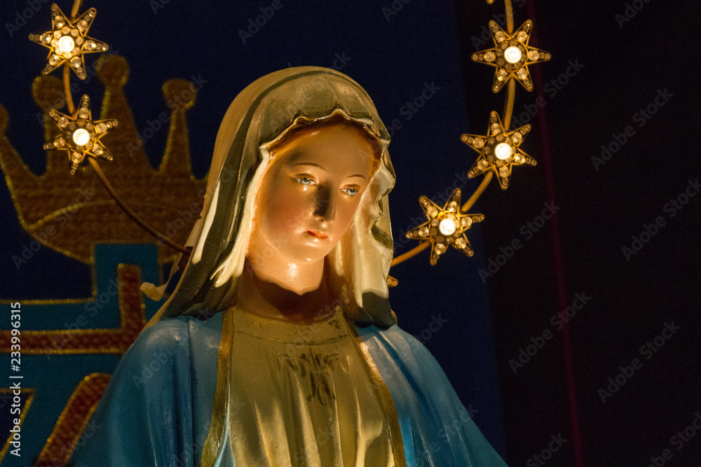Casorate Primo, Italy. 2017/12/8. Notre Dame de Lourdes (Our Lady of Lourdes) - a statue of Virgin Mary in the church of San Vittore Martire. Casorate Primo, Italy. 2017/12/8. Notre Dame de Lourdes (Our Lady of Lourdes) - a statue of Virgin Mary in the church of San Vittore Martire.