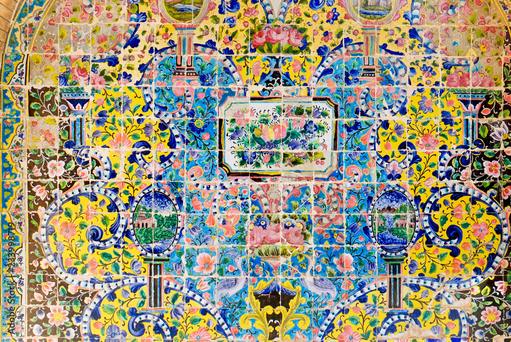Decorative ceramic tilework on the wall of Golestan palace. Tehran, Iran