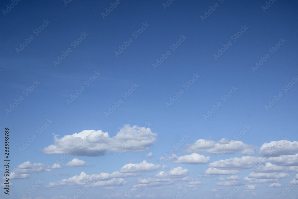 Fototapeta premium Sky with white clouds pattern background.