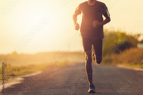 Fototapeta Naklejka Na Ścianę i Meble -  The man with runner on the street be running for exercise.