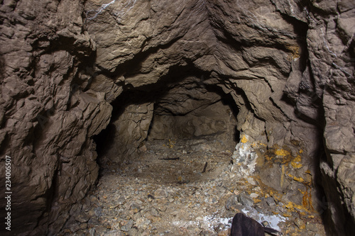 Underground abandoned gold iron ore mine shaft tunnel gallery passage © Mishainik