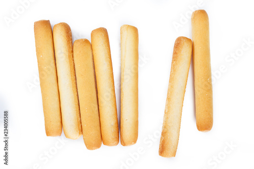 Photos bread sticks top view on white background.
