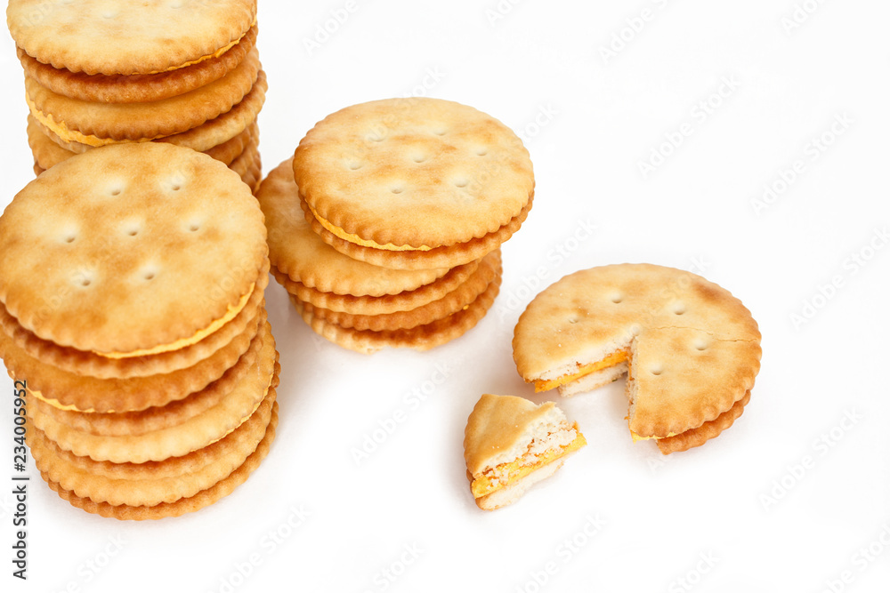 Crackers broken in half top view on white background. Crackers broken in half top view on white background.