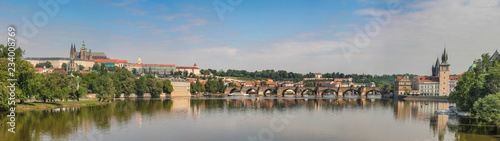 View of the Vltava Embankment, Charles Bridge and St. Vitus Cathedral in Prague, Czech Republic
