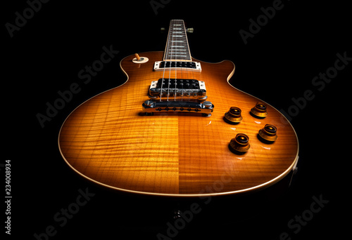 Electric guitar on a black background photo