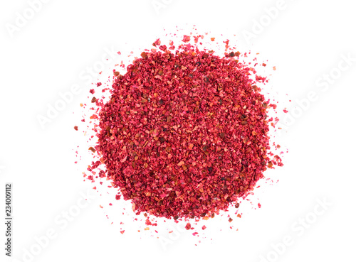 Dry Sumac Spice Heap. Top-Down View. Isolated on White Background.