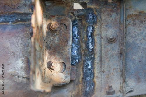 badly welded rusty metal