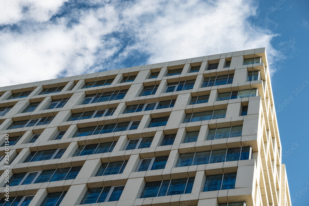 The facade of the house against the blue sky.