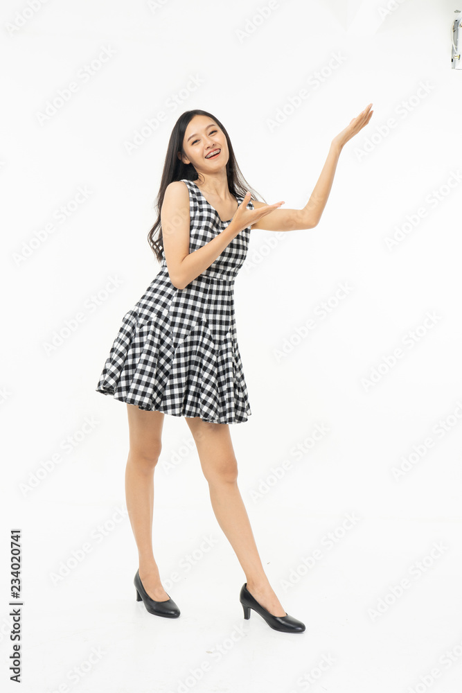 portrait of excited surprised attractive inspired girl jumping up isolated on background.Freedom legs stylish feet glamorous people teenager asian. portrait of excited surprised attractive inspired girl jumping up isolated on background.Freedom legs stylish feet glamorous people teenager asian.