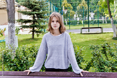Cute blond girl fourteen years old photo
