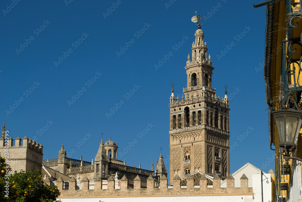 the stupendous bell tower of the Gothic Cathedral of Seville, Spain