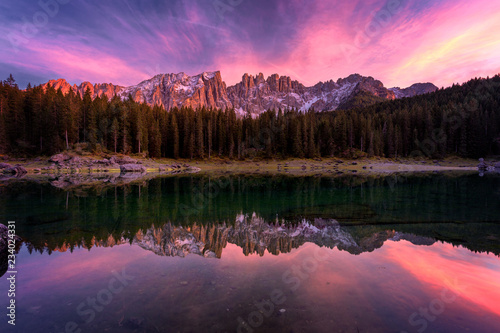 Beautiful sunset at Carezza lake, Dolomites, Italy, Europe photo