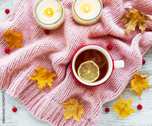 autumn flat lay with cup of tea and leaves