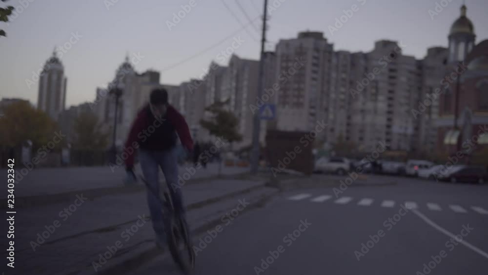 Cruising on bmx bicycle on streets. Close up. Cruising on bmx bicycle on streets. Close up.