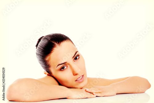 Beautiful nude woman isolated on white background.