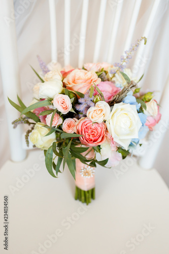 Sweet wedding Bouquet with roses of the Bride