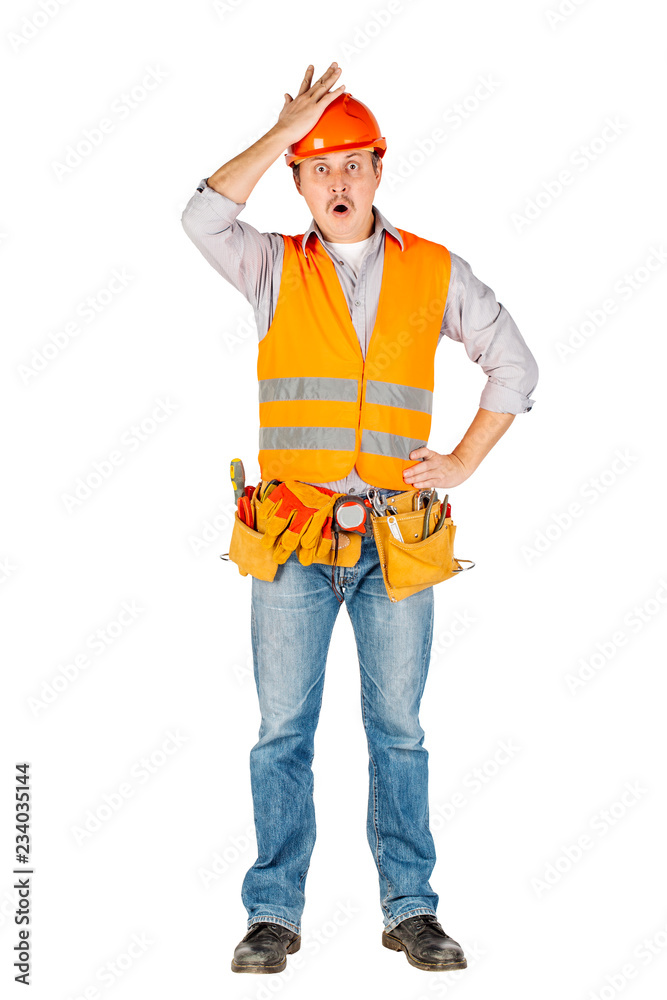Portrait of a male builder in a helmet looking at camera over white wall background. repair, construction, building, people and maintenance concept. Portrait of a male builder in a helmet looking at camera over white wall background. repair, construction, building, people and maintenance concept.