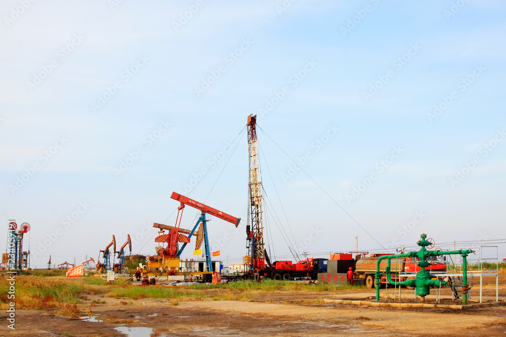 oil drilling operation scene in the JiDong oilfield, China.
