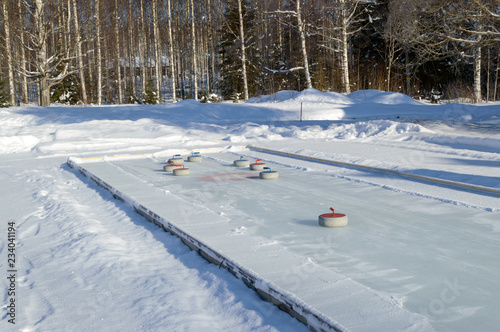 Curling field in finland winter forest