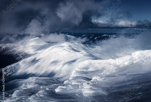 Fantastic winter landscape with snowy hills. Carpathian mountains, Ukraine. Landscape photography