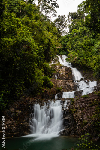 Long exposure of a beautiful waterfall running through tropical rainforest  Lampi  Thailand 