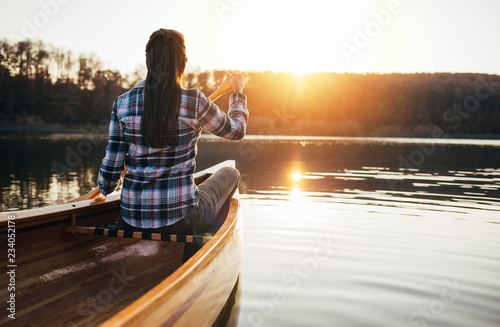 Canoeing on the sunset lake