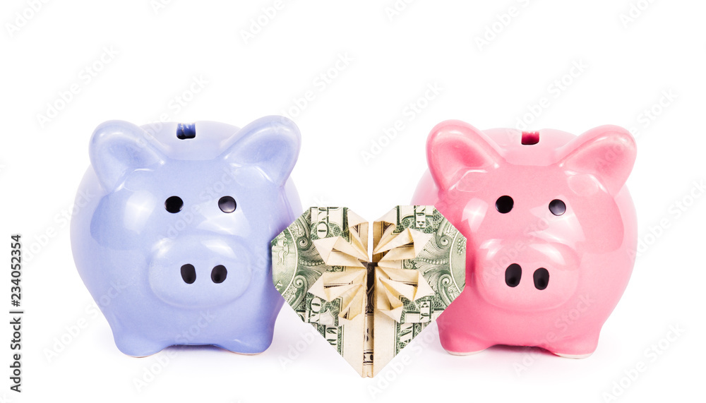 Two piggy banks on white background. Heart of origami from the dollar. Valentine's heart. Dollar heart shape on white background
