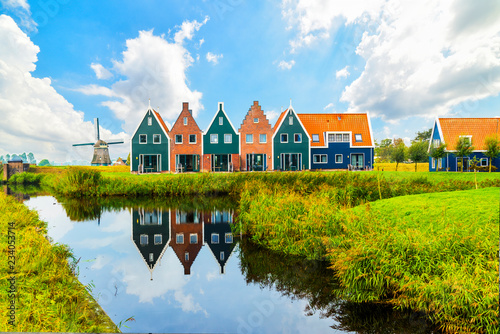 Volendam is a town in North Holland in the Netherlands. Colored houses of marine park in Volendam. North Holland, Netherlands.. photo