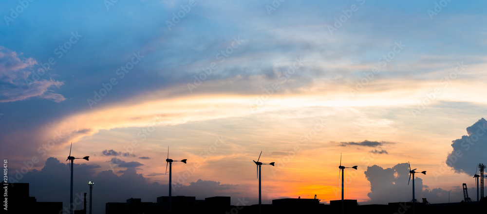 Wind turbine power generator at twilight