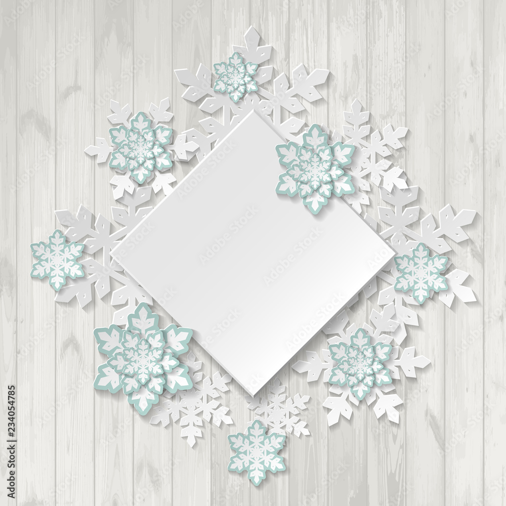Paper snowflakes on wooden background with place for your text. Paper snowflakes on wooden background with place for your text.
