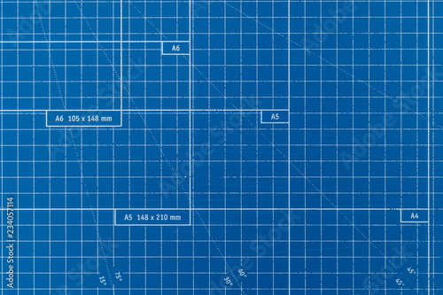 Paper cutting checkered board blue colored surface.
