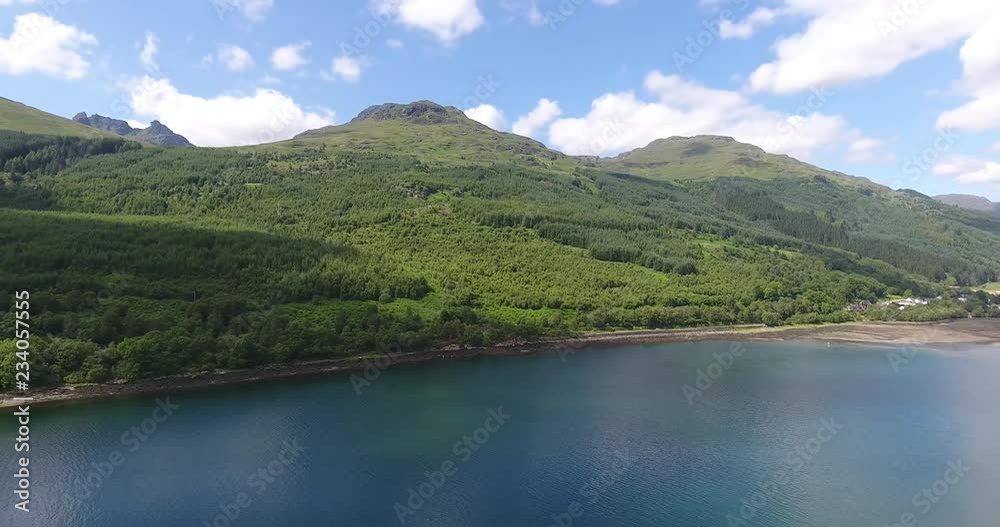 Blue Green Lake Drone Shot with Forested Landscape in Scotland - Aerial View Loch Fyne in the Highlands Blue Green Lake Drone Shot with Forested Landscape in Scotland - Aerial View Loch Fyne in the Highlands