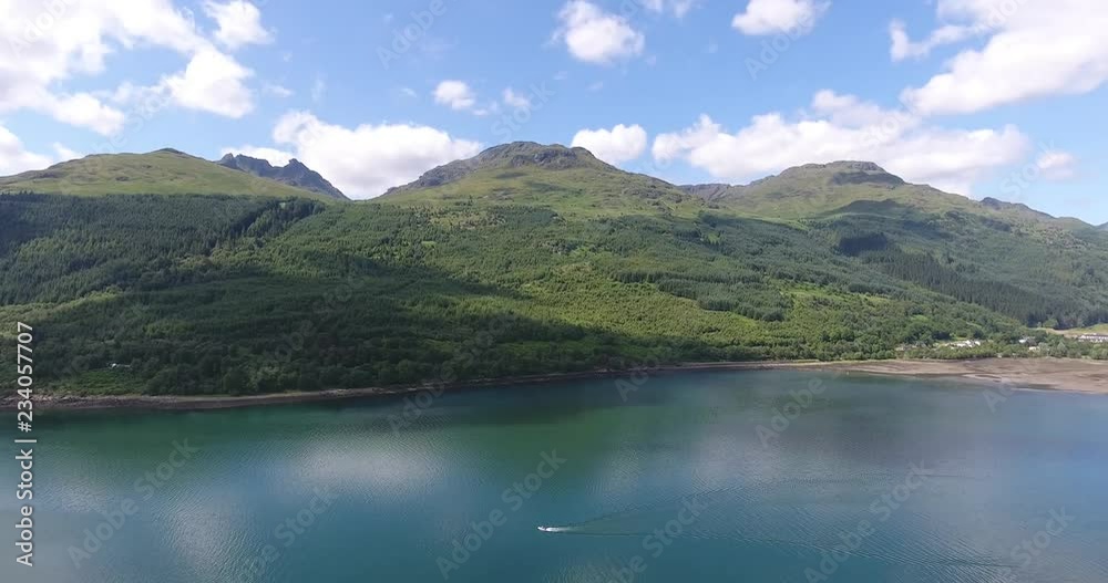 Blue Green Lake Drone Shot with Forested Landscape in Scotland - Aerial View Loch Fyne in the Highlands Blue Green Lake Drone Shot with Forested Landscape in Scotland - Aerial View Loch Fyne in the Highlands