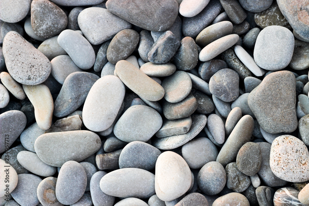 gray stones, many stones, round stones of gray color gray stones, many stones, round stones of gray color