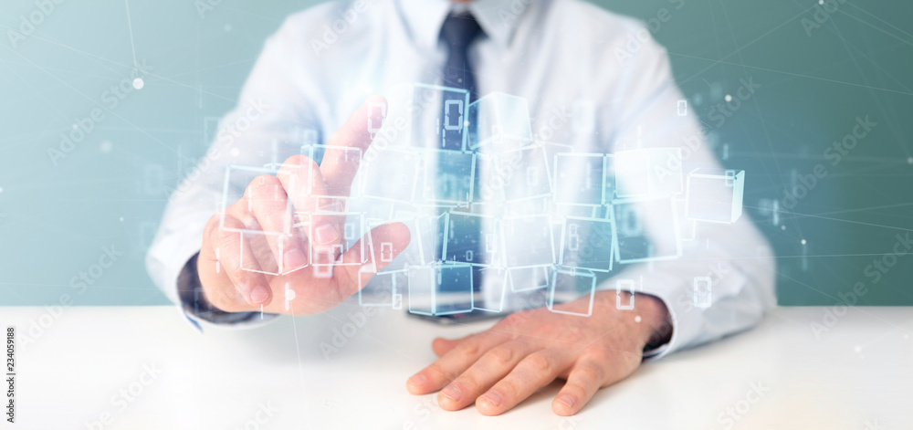 Businessman holding a Cloud of blockchain cube and binary data 3d rendering