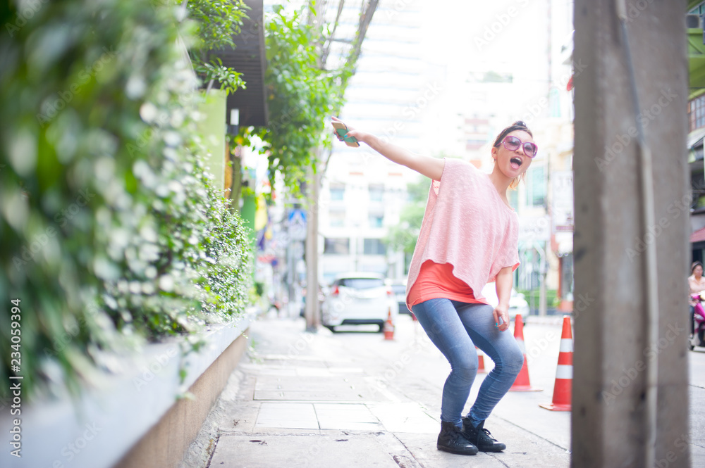 Japanese girl poses for pictures in Bangkok, Thailand