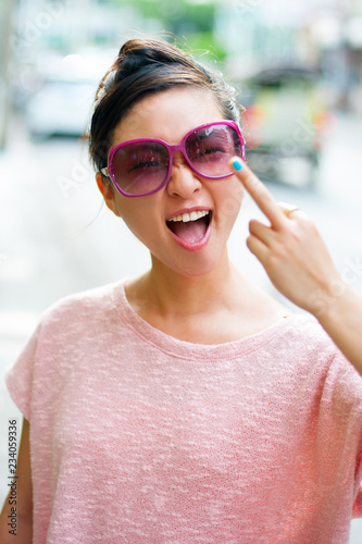 Japanese girl poses for pictures in Bangkok, Thailand © J Photography