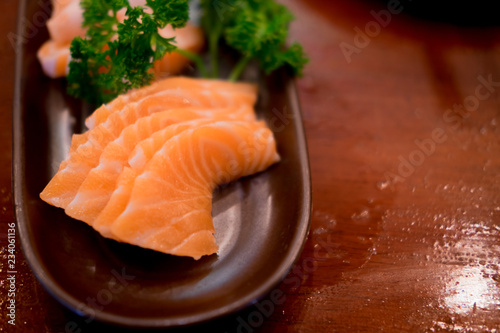 Raw salmons fillet on dish in restaurant