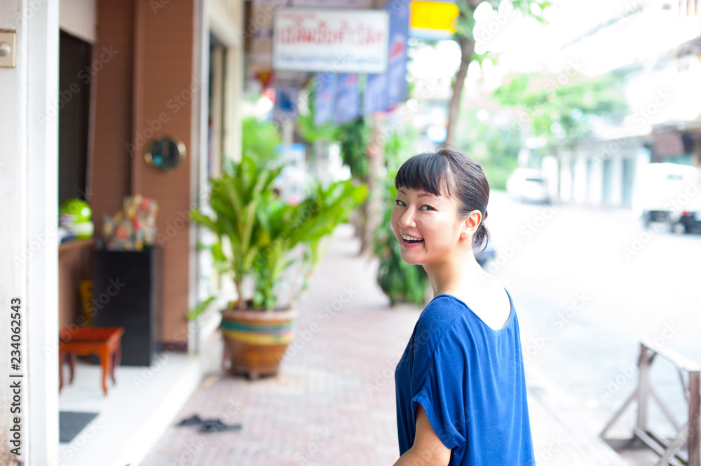Japanese girl poses for pictures in Bangkok, Thailand