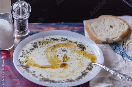 traditional Turkish soup in winter: plateau soup; yogurt, rice, mint with butter