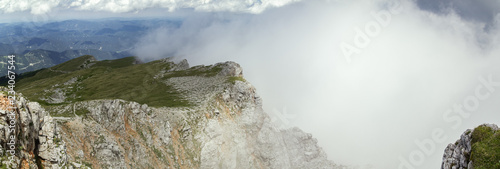 The corner of the cliff and a cloud photo