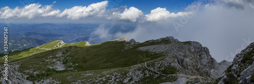 The corner of the cliff and a cloud