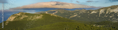 Strange cloud above mountain ridge and sunrise in the Austrian Rax Alps photo