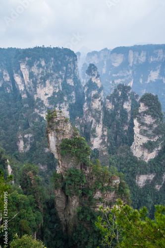 Zhangjiajie Forest Park. Panoramic view above the cliffs and mountains to the colorful valley. Picturesque landscape. Majestic nature. China  January 2017.