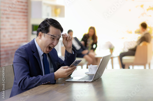 Businessman working in cafe photo