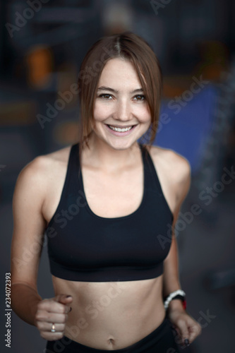 close up.portrait of an attractive woman in the gym