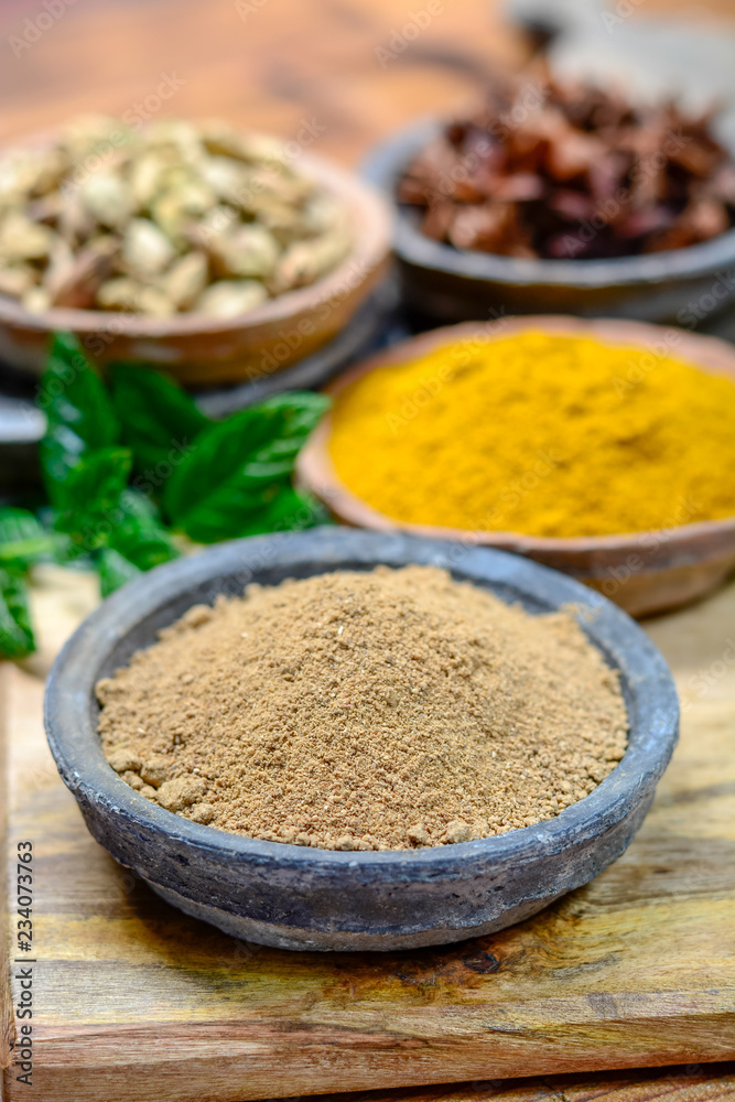 Amchoor or aamchur, mango powder, fruity spice powder made from dried unripe green mangoes in India, used to flavor foods close up