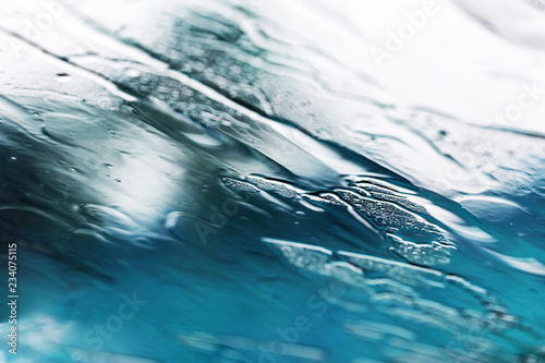 Heavy rain background, Raindrops on window glass outdoors