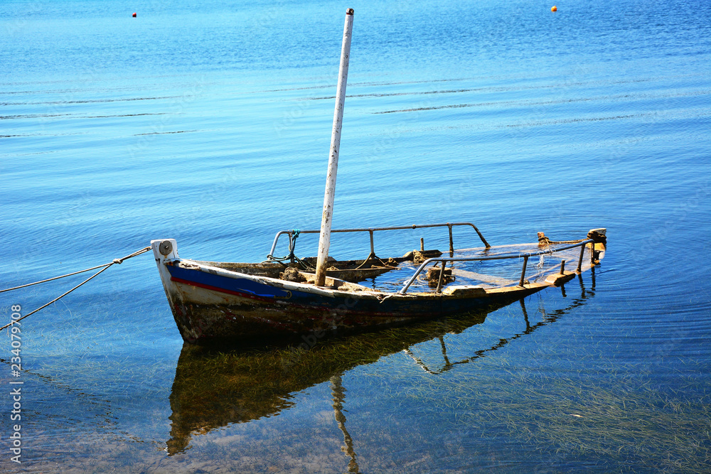 Fototapeta premium fishing boat on the beach