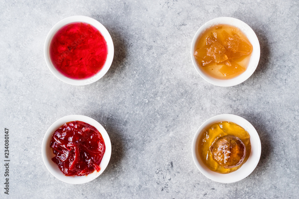 Assorted Variety of Jams and Marmalades;  Rose, Red Pepper, Mandarin and Citron Peel in Small Bowl.